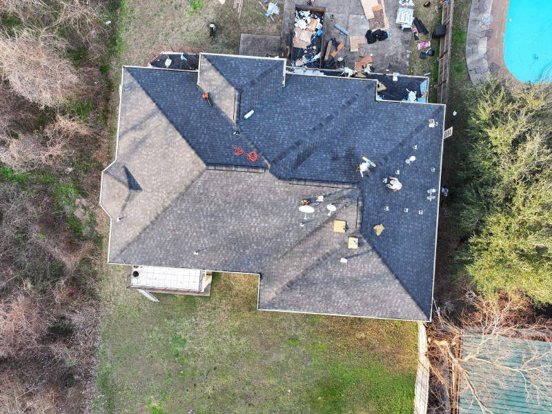 Storm-Damaged Roof Rebuilt, Deck Repairs Included — Houston, TX
