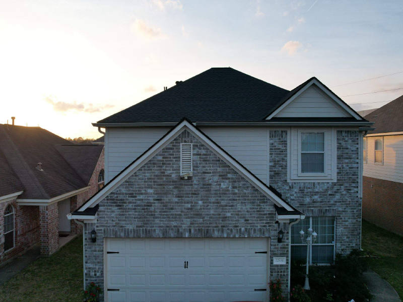 Slate-Gray Roof on Stone-Front Home — Spring, TX