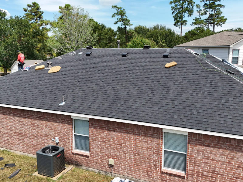 Rustic Black Shingle Roof Replacement — Spring, TX