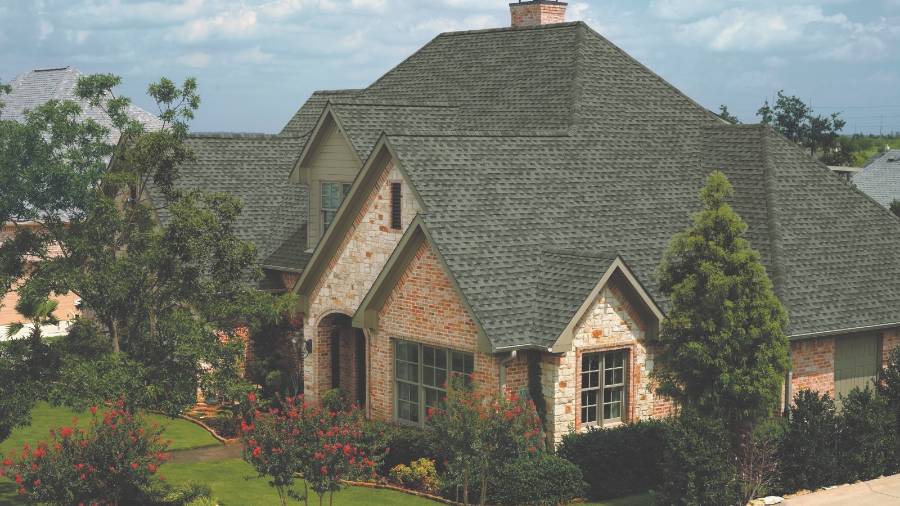 A finished roof in GAF Timberline HDZ Slate on a home